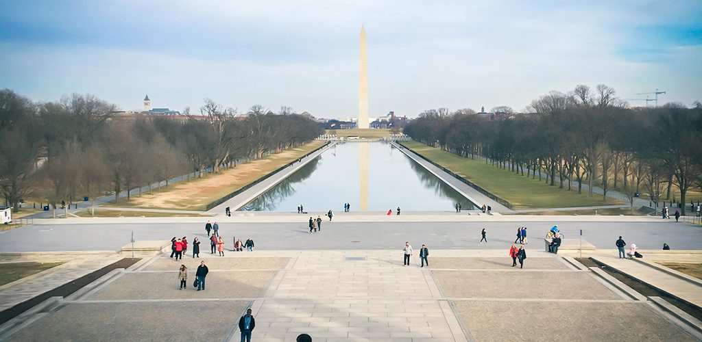 People standing in front of the Washington Monument