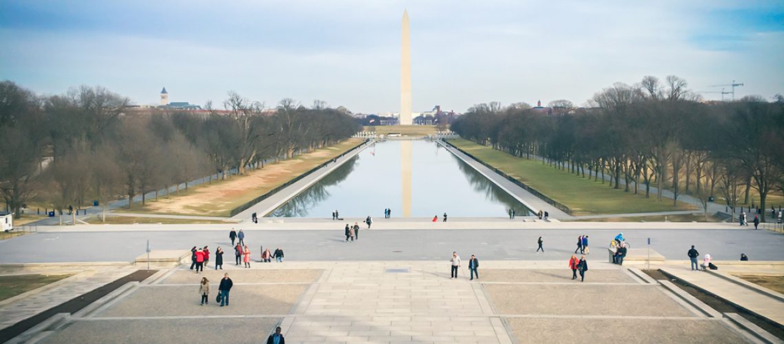 People standing in front of the Washington Monument