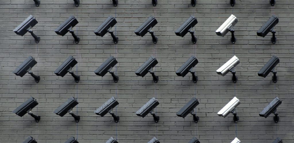 Surveillance cameras on wall